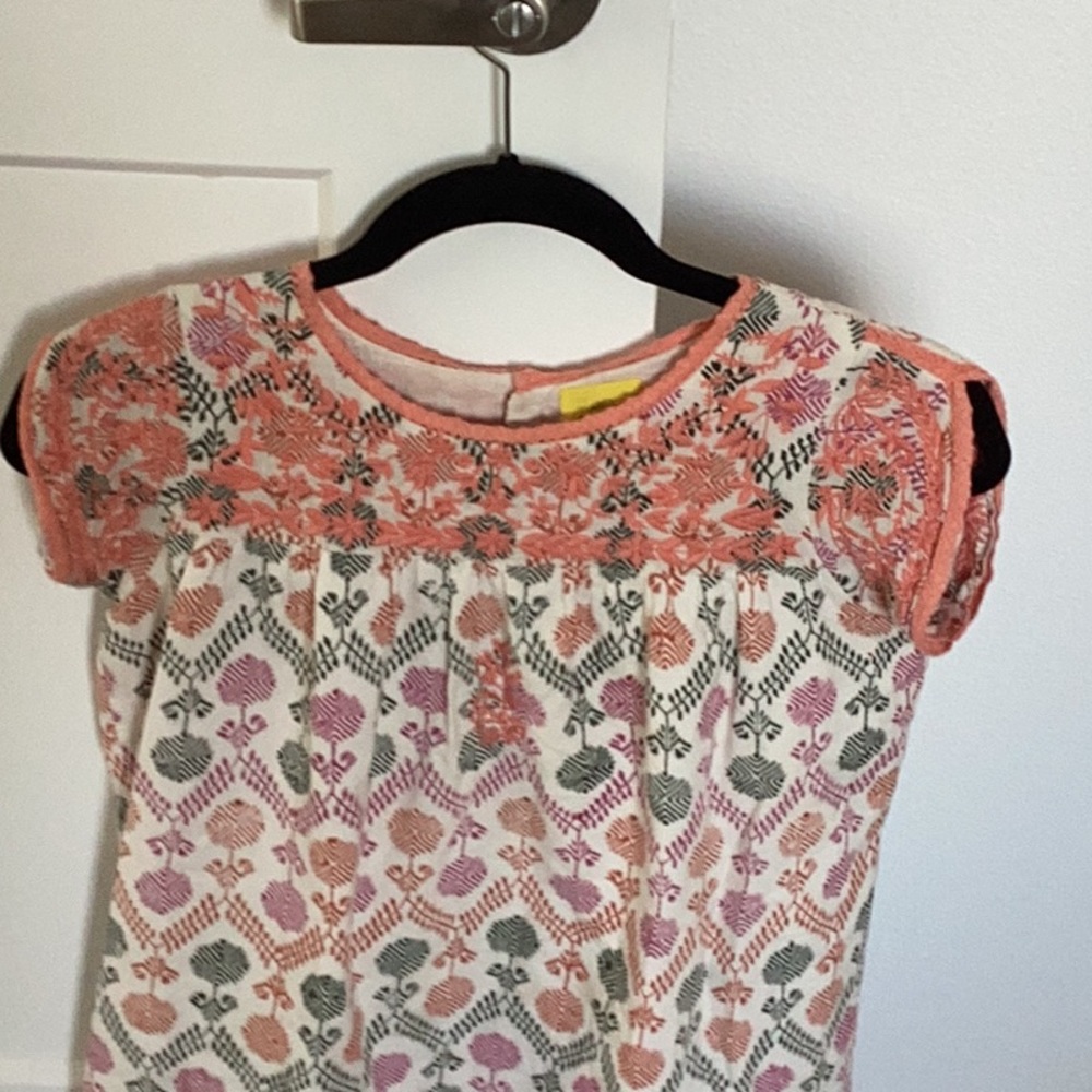 Girls dress with embroidered top in pink and multicolored.